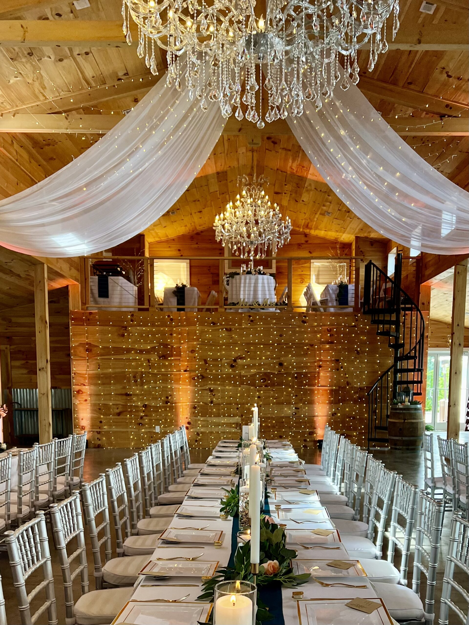 barn interior featuring a beautiful wedding reception