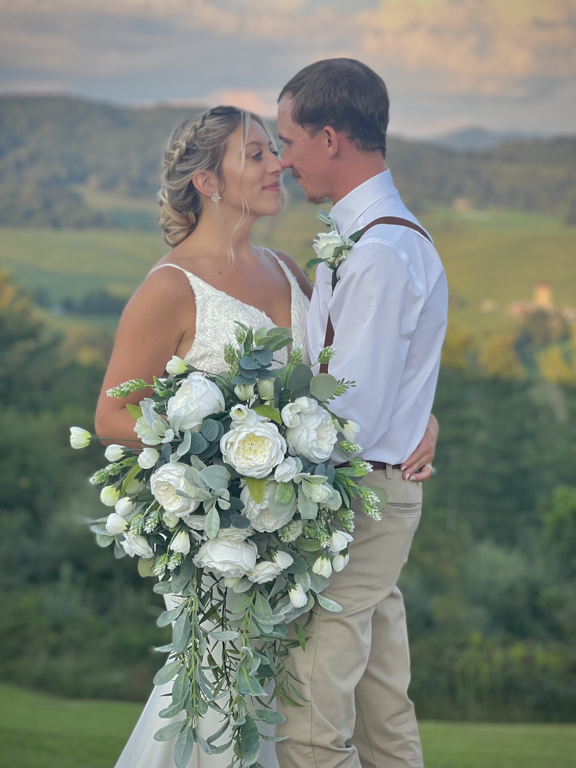 bride and groom embracing